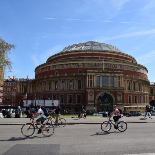 two people cycling in london